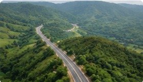 Road through hills from aerial view